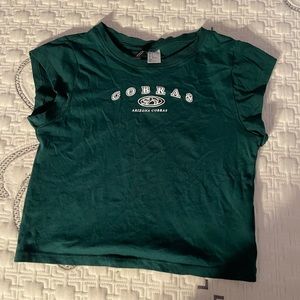 green baby tee